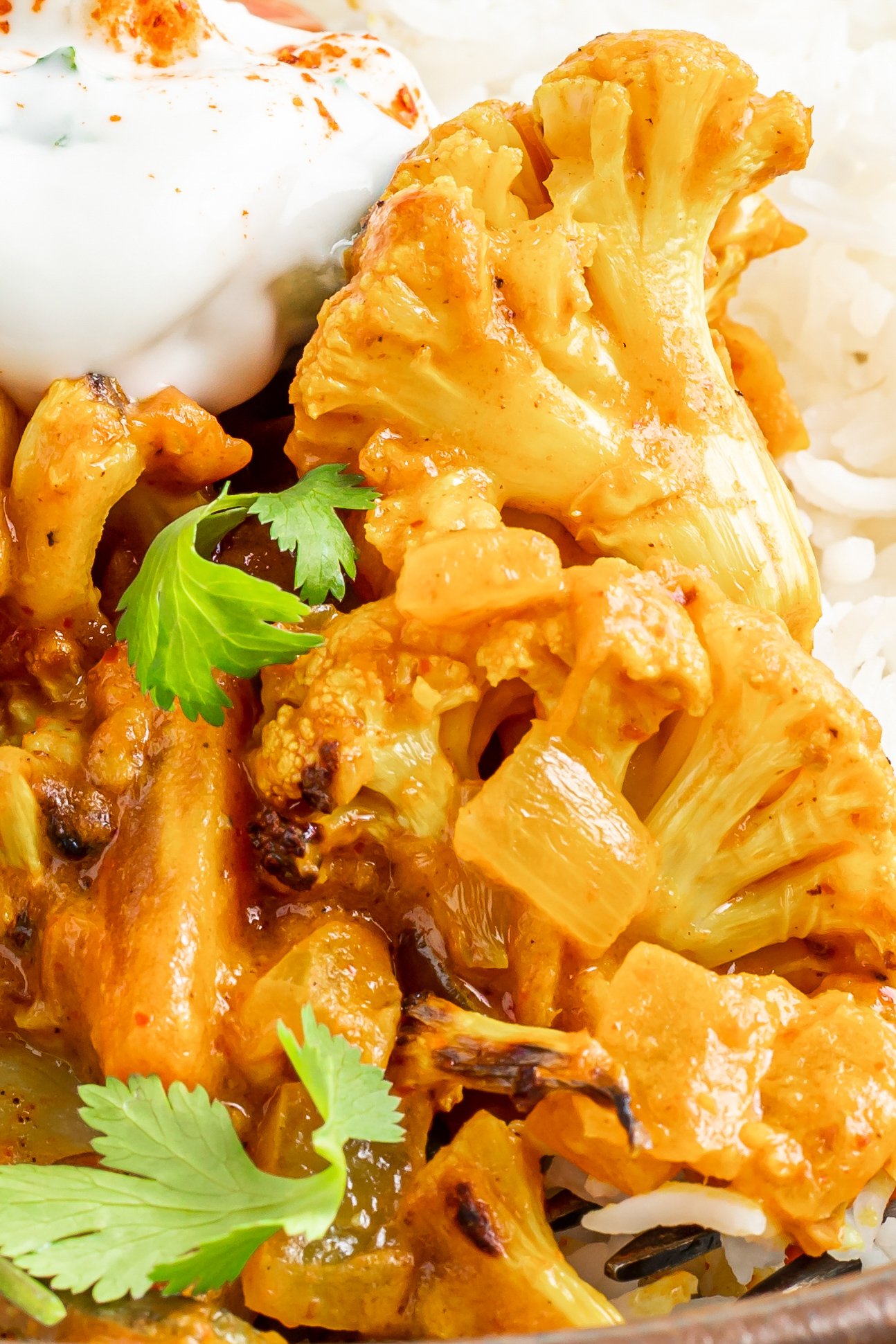 Cauliflower Curry Recipe with rice and parsley. 