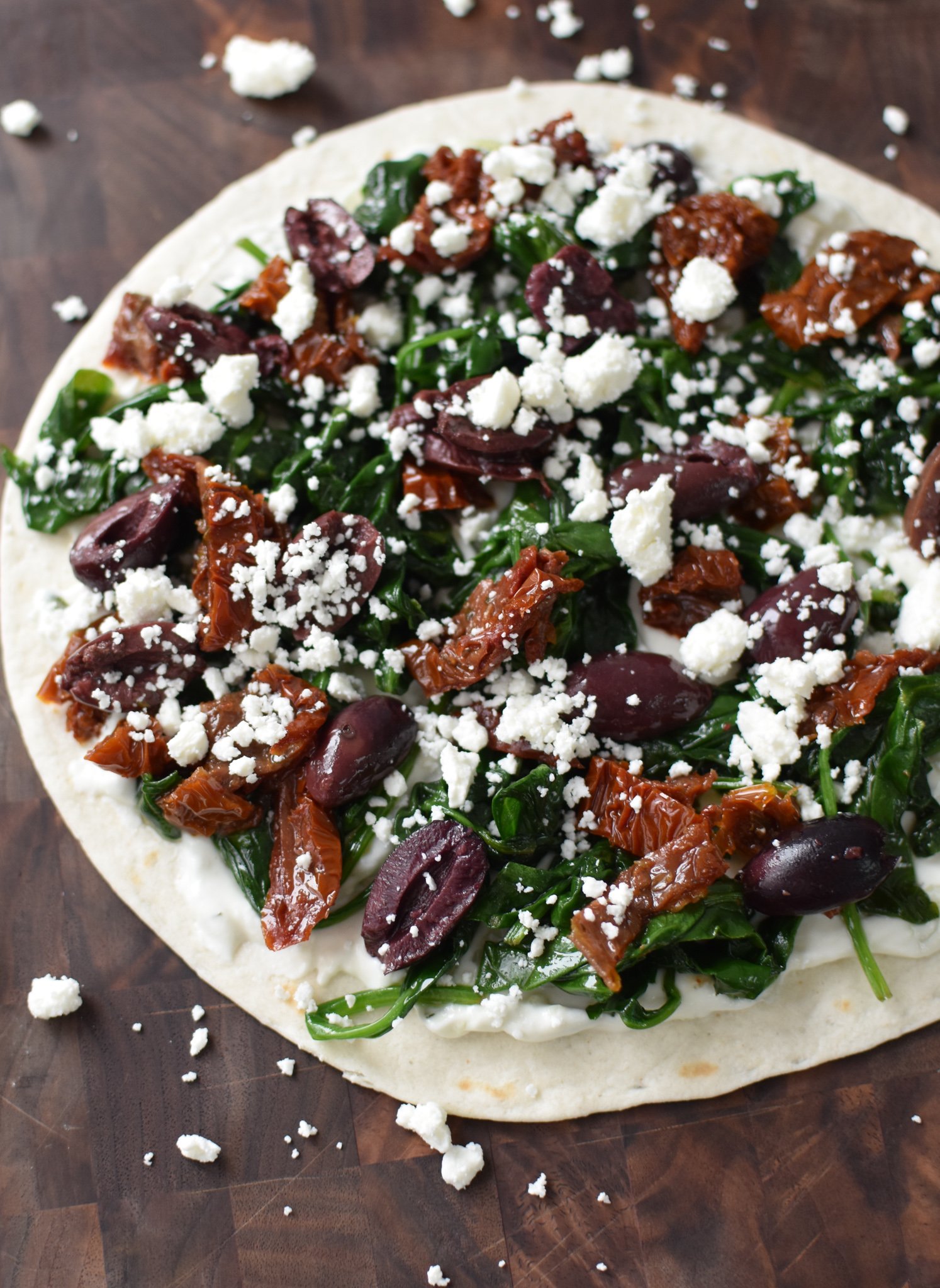 Easy Vegetarian Quesadilla Recipe ingredients on a tortilla.