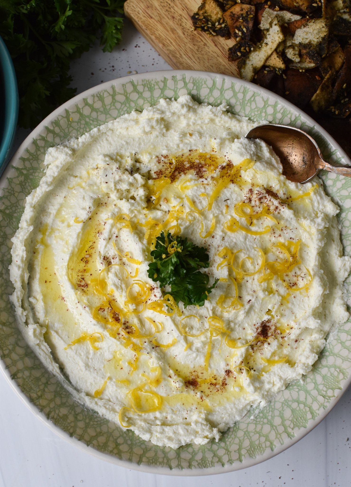 Lemon Whipped Feta Dip with a spoon.