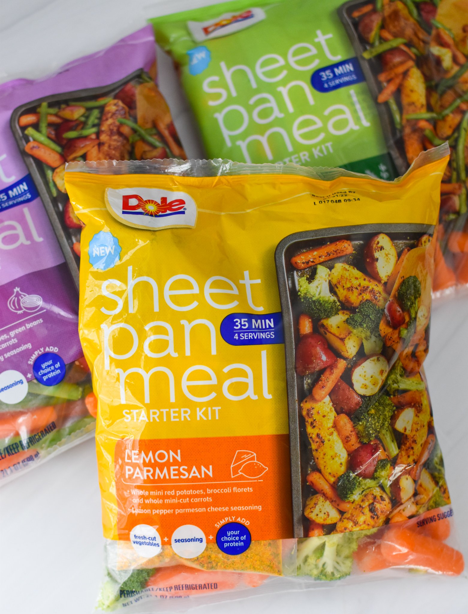 Sheet Pan Lemon Parmesan Chicken Tenders Dole meal kit packages. 