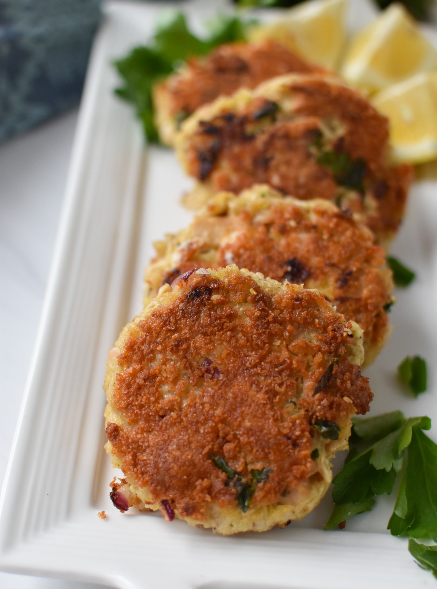 Mediterranean Tuna Patties Recipe on a white plate.