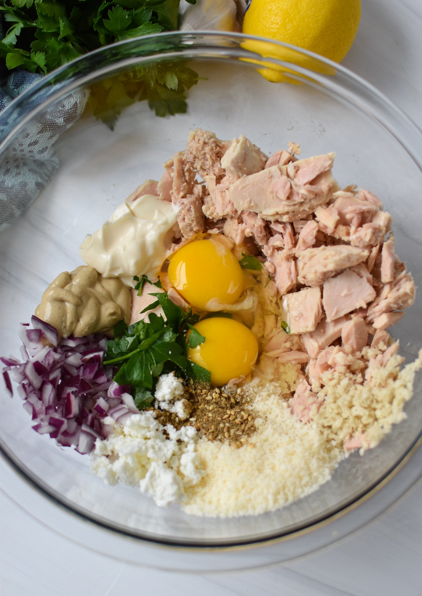 Mediterranean Tuna Patties Recipe ingredients in a bowl.