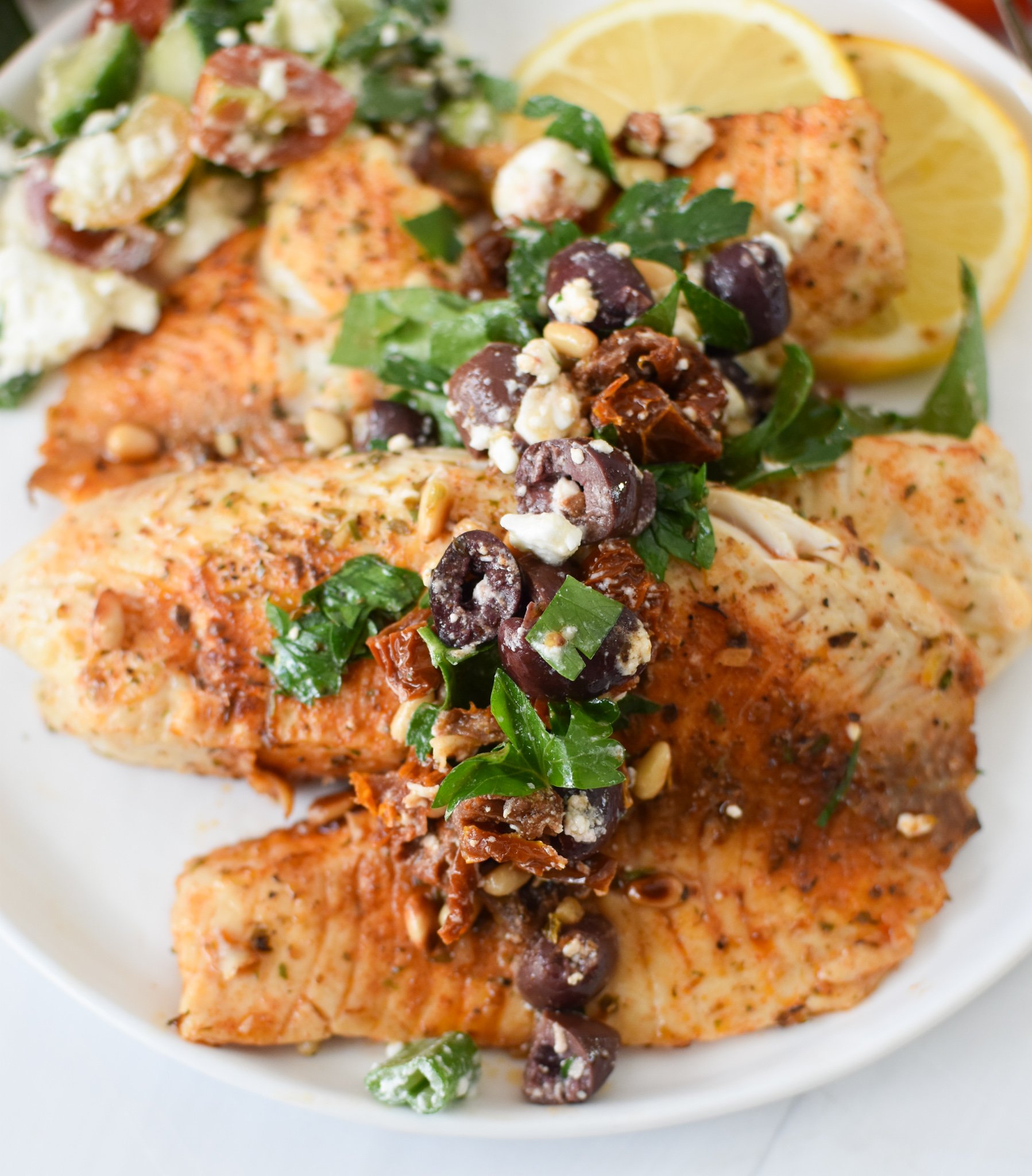 Greek Baked Tilapia with olive tapenade.
