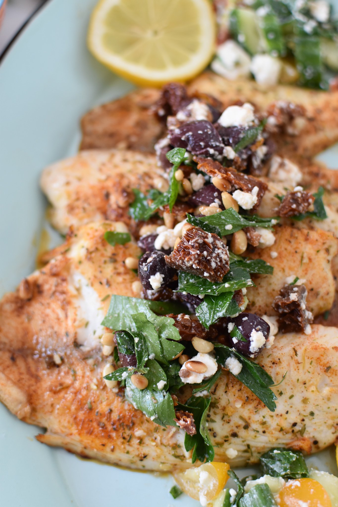 Greek Baked Tilapia with olive tapenade.