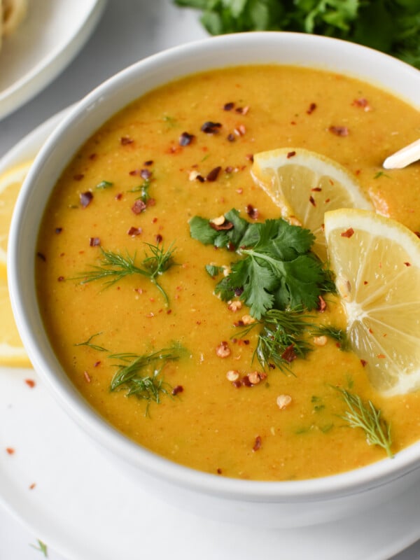 Lemon Lentil Soup Recipe with lemon wedges.