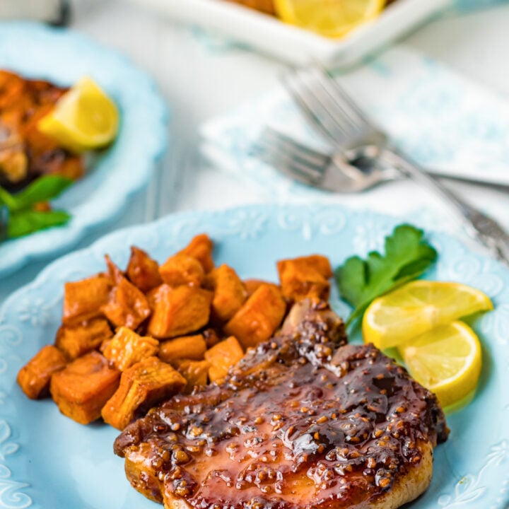 Maple Bourbon Pork Chops Recipe on a blue plate.
