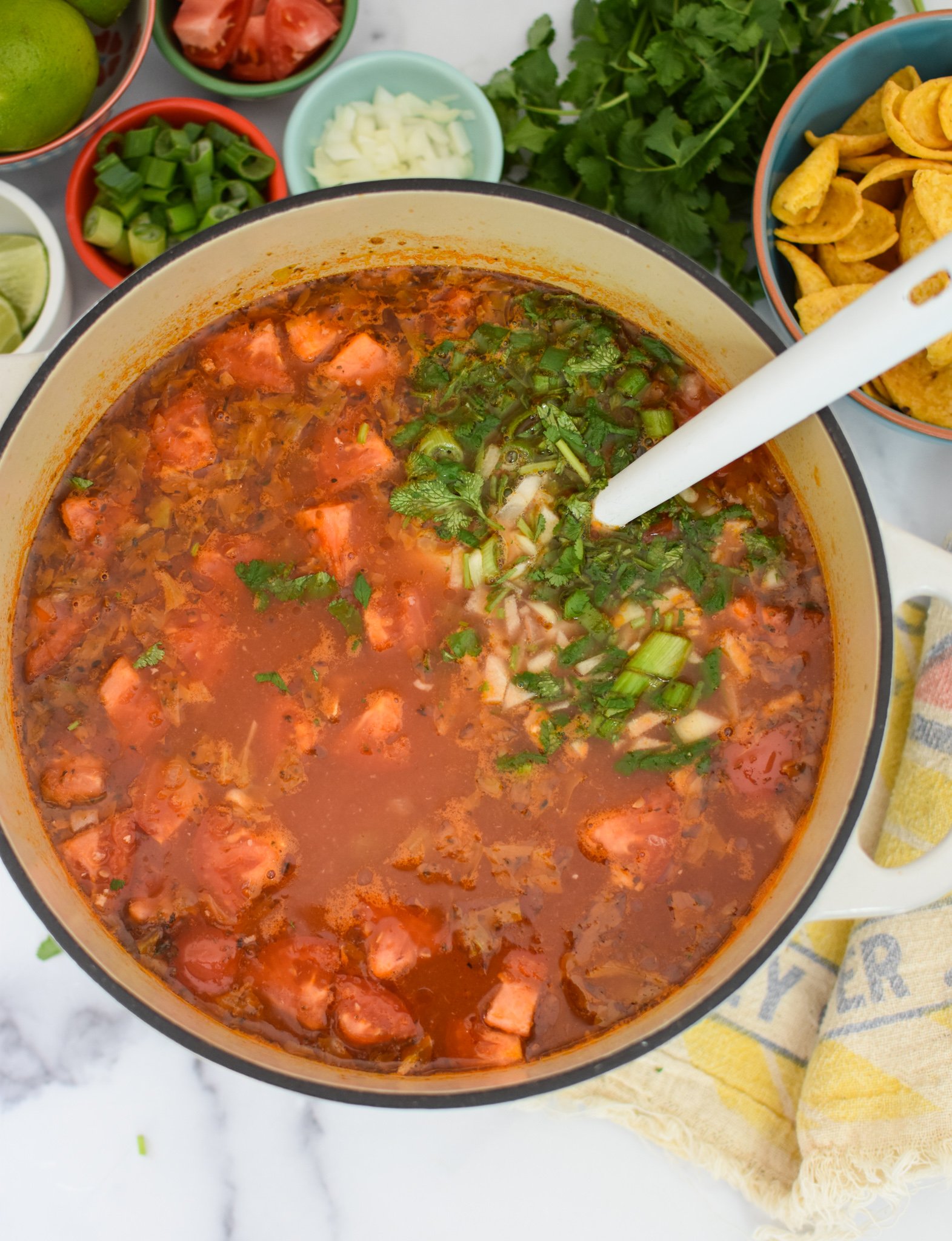 Chicken Potato Soup Recipe with cilantro in a pot.