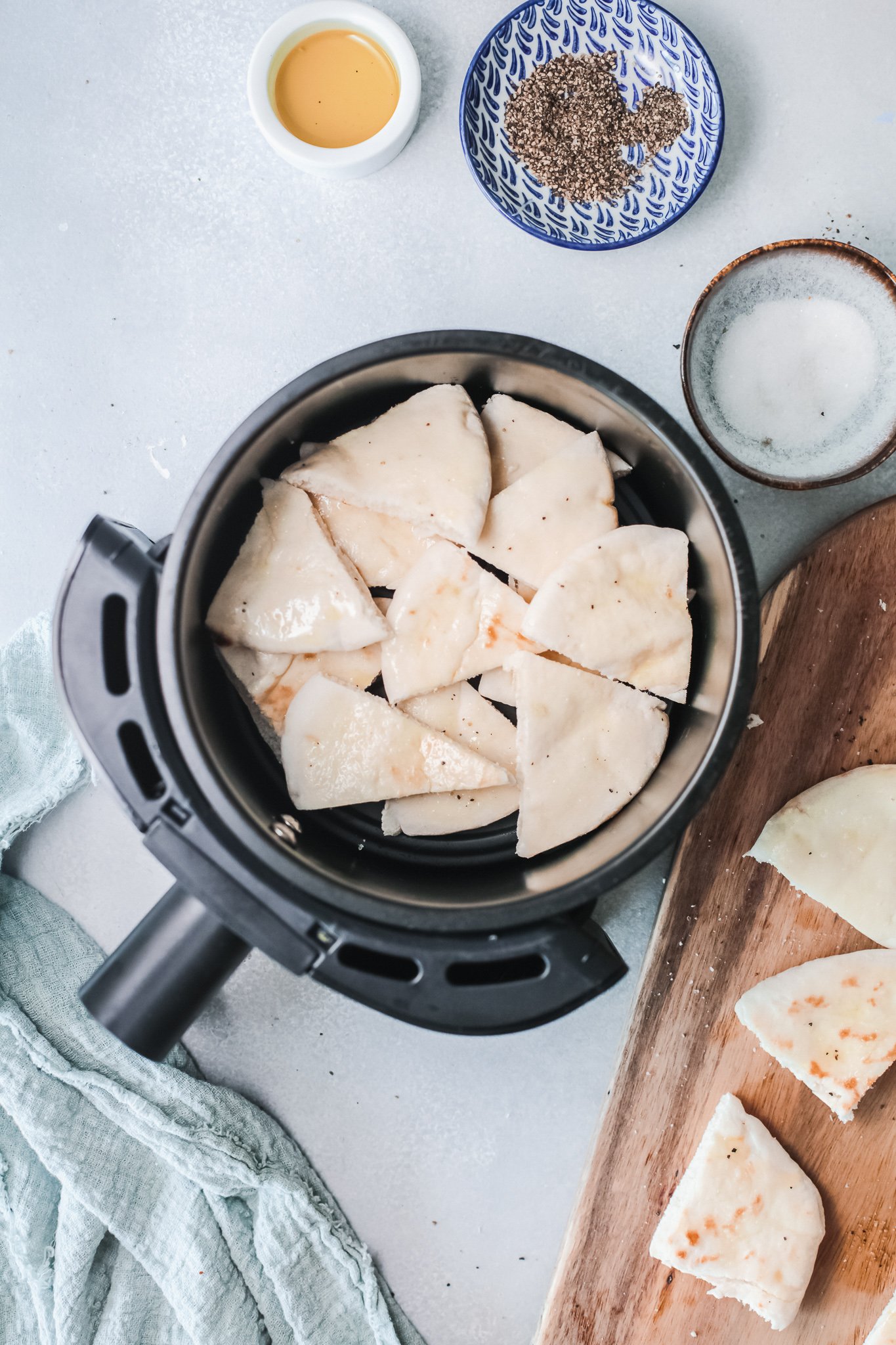 Air Fryer Pita Chips in an air fryer.