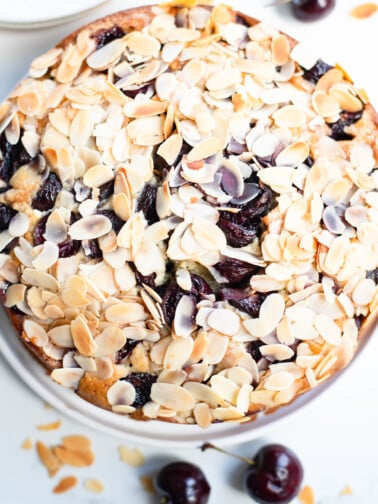 Cherry Almond Cake on a white plate.