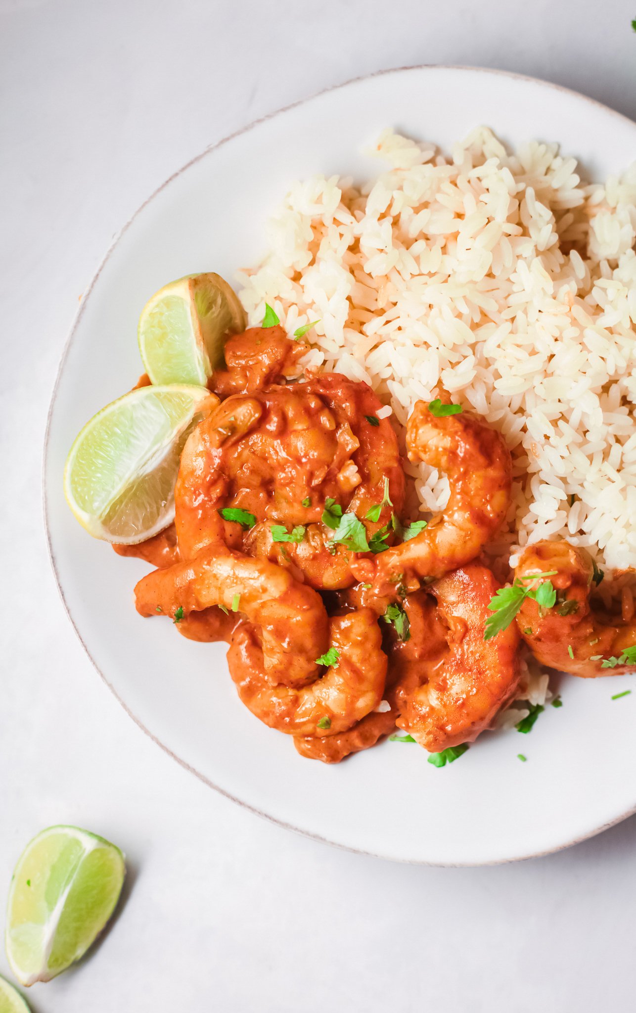 Easy Shrimp Curry with lime wedges.