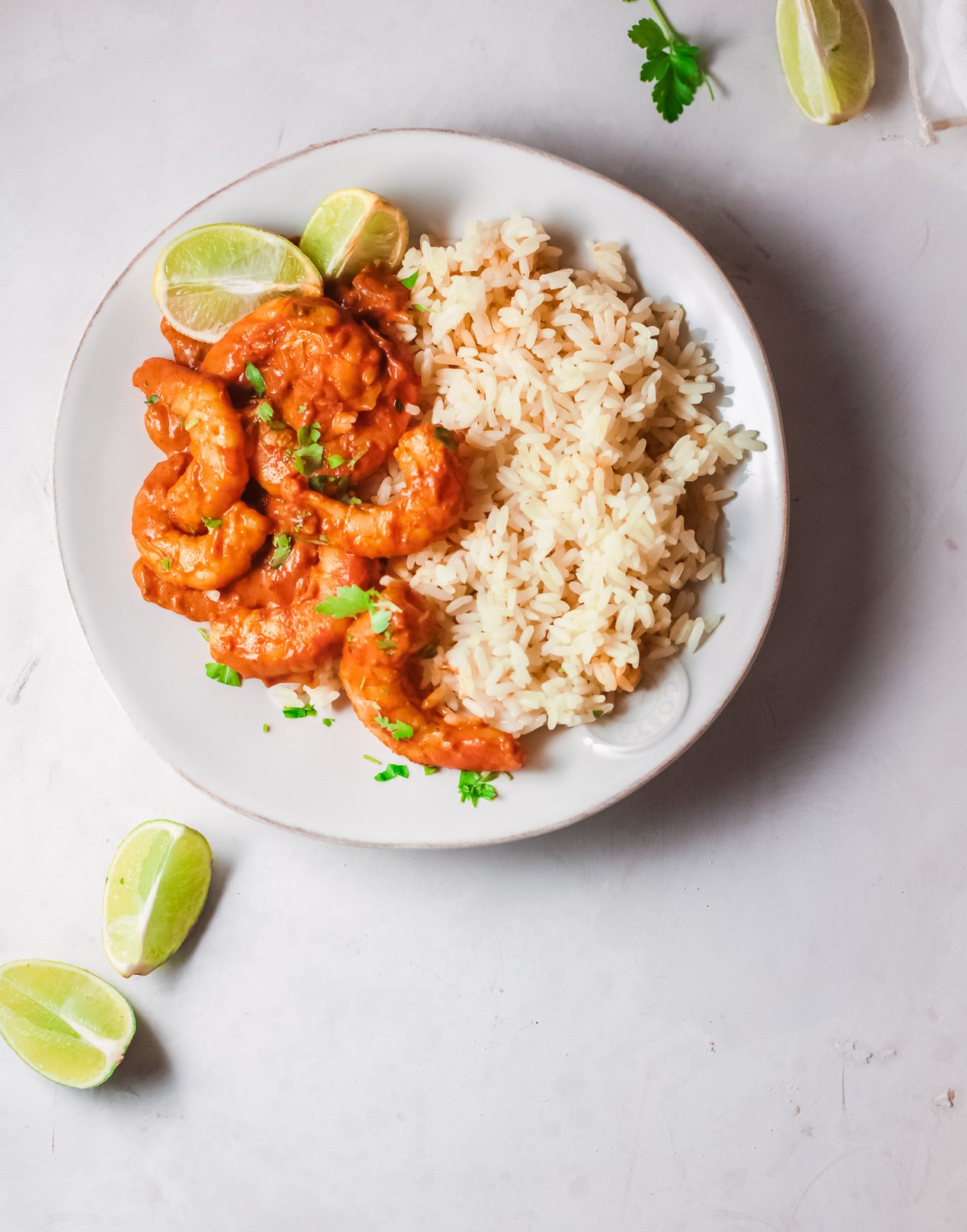 Easy Shrimp Curry Recipe with lime wedges.