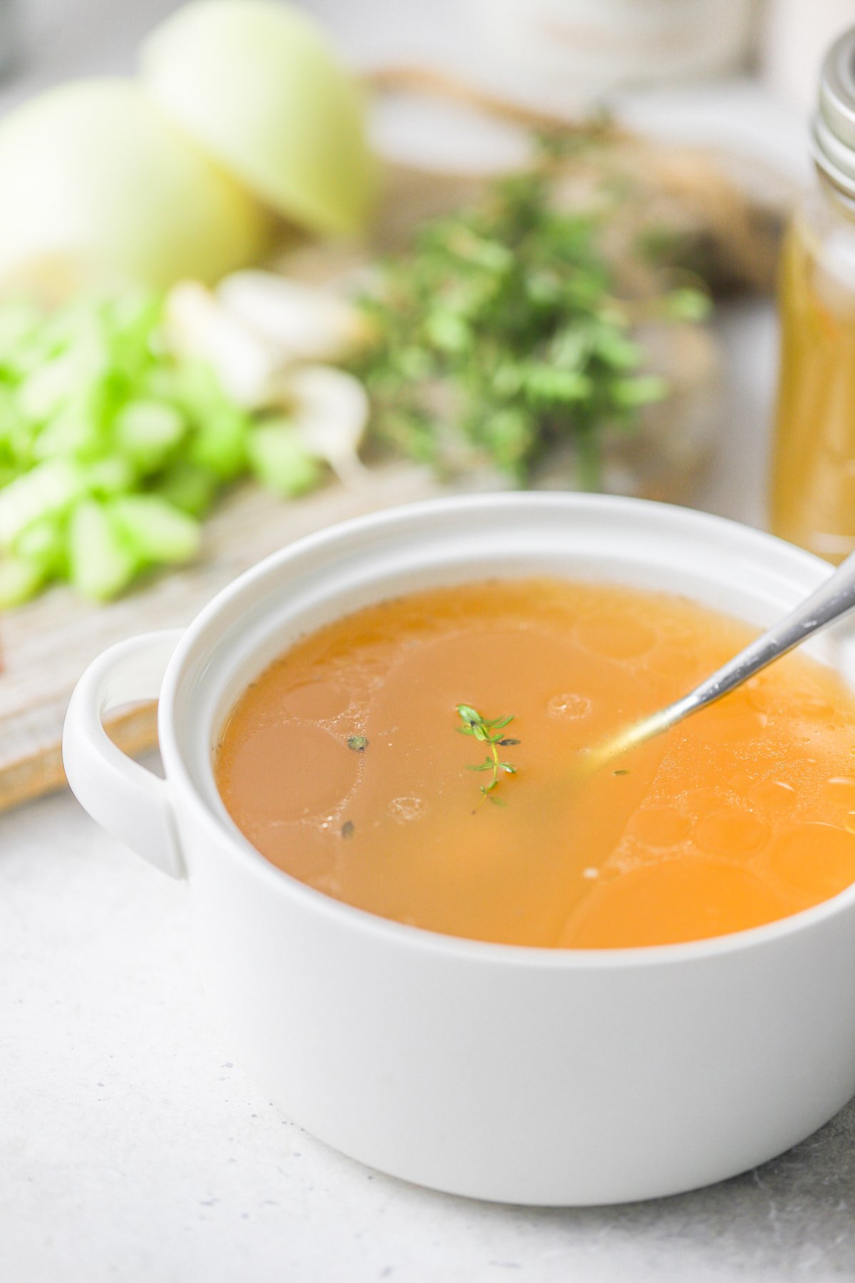 Homemade Chicken Broth with spoon.