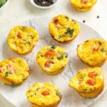Caprese Egg Muffins on a plate.