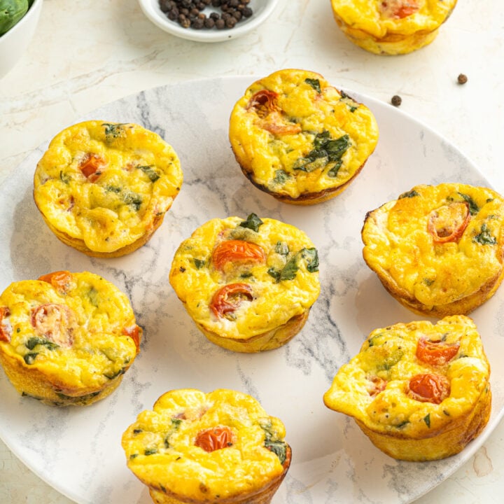 Caprese Egg Muffins on a plate.