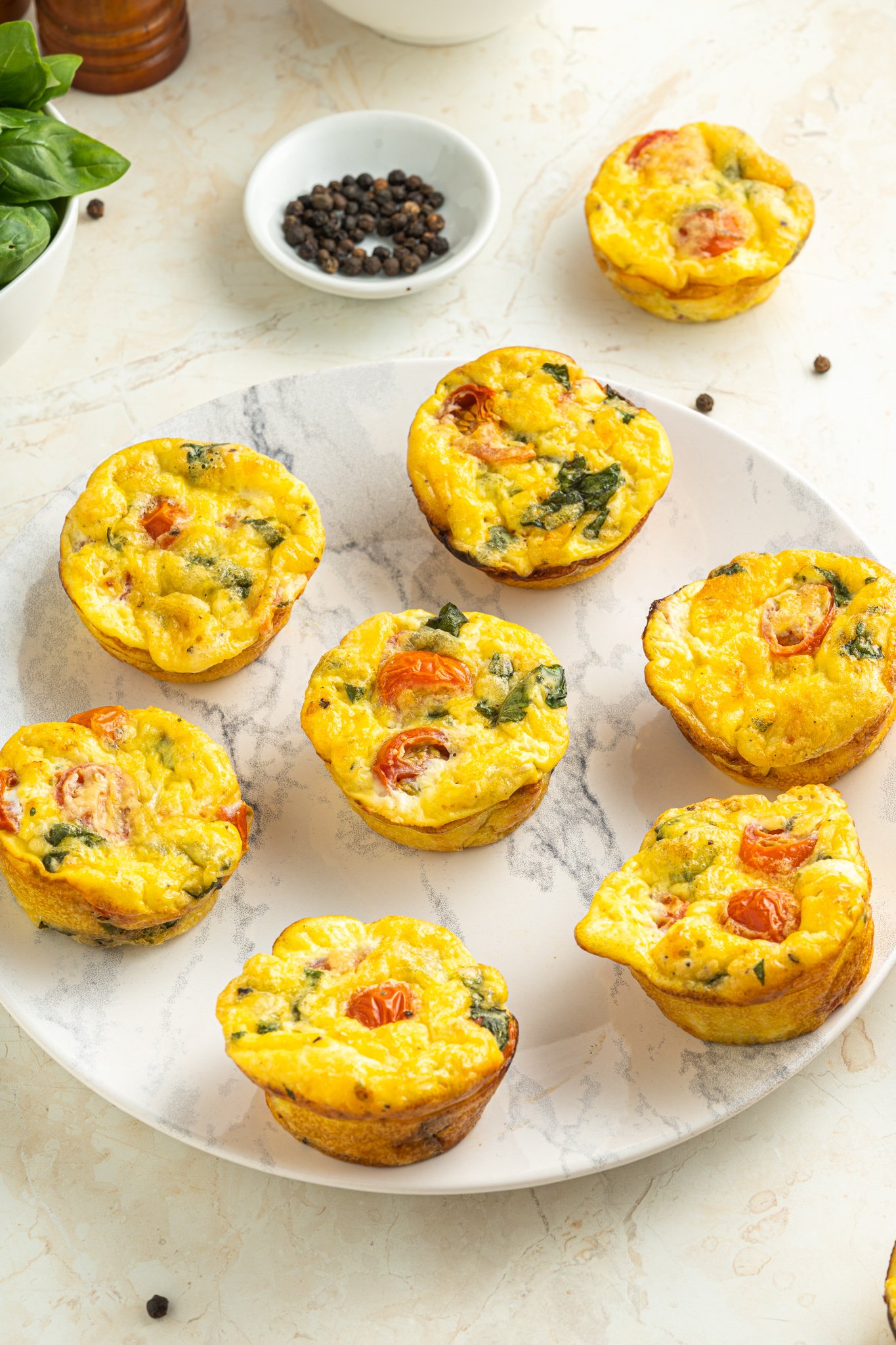 Caprese Egg Muffins on a plate.