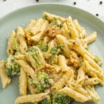 Creamy Broccoli Pasta Recipe with a light green plate.