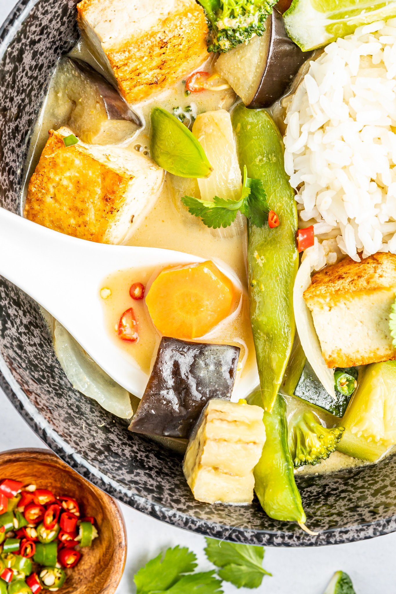 Thai Vegetable Green Curry with spoon.