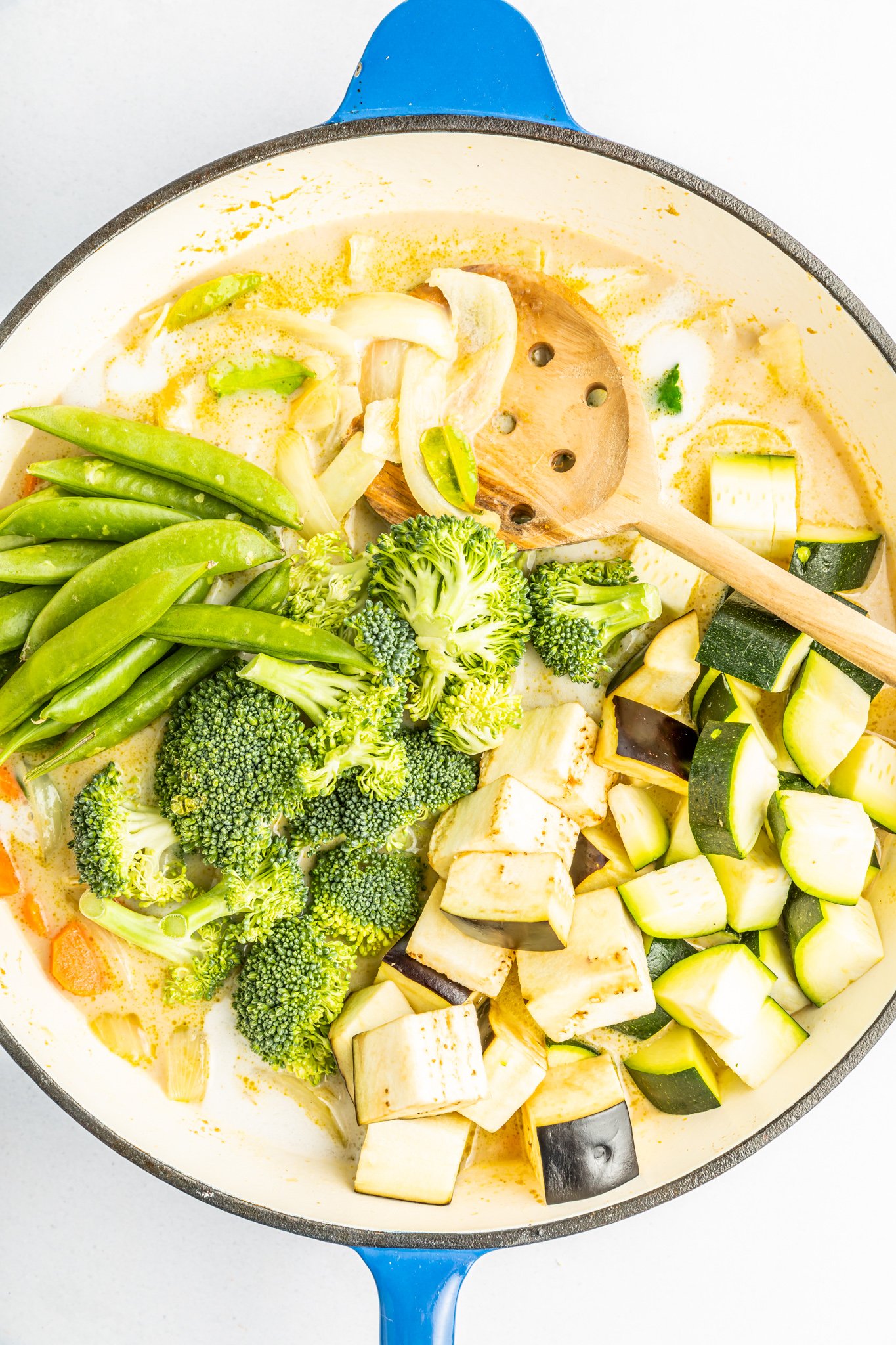 Thai Vegetable Green Curry with curry sauce in a pot. 
