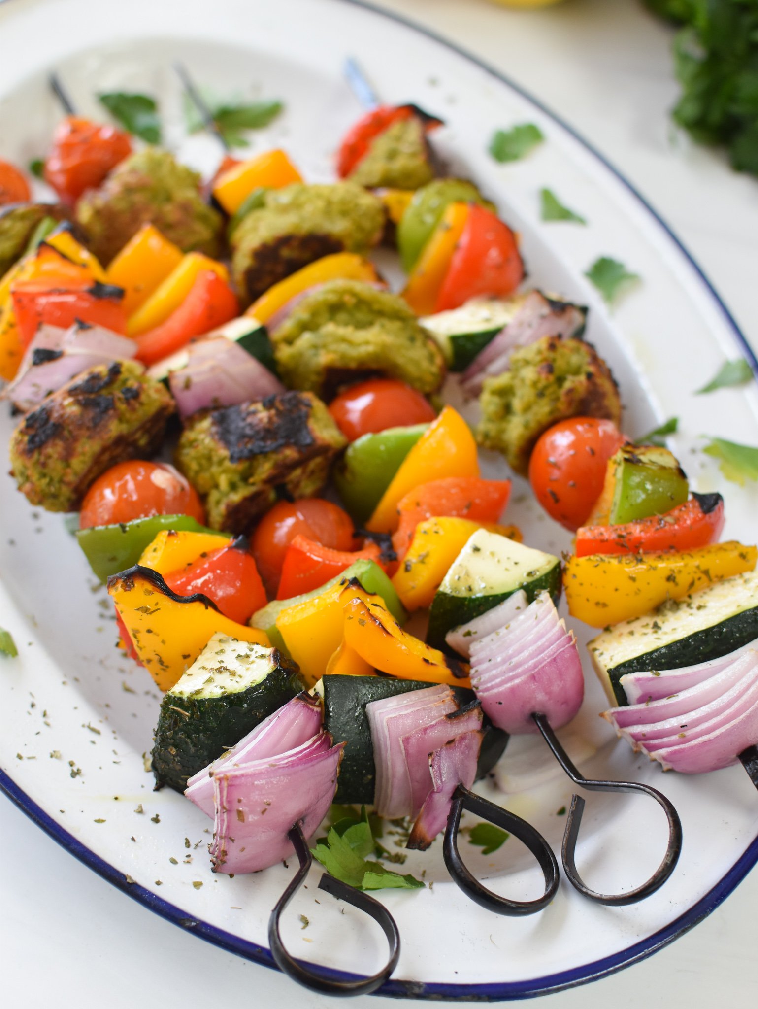 Falafel Vegetable Kabobs on a white platter. 