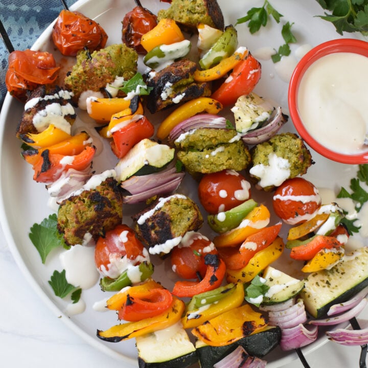 Falafel Vegetable Kabobs on a white plate.