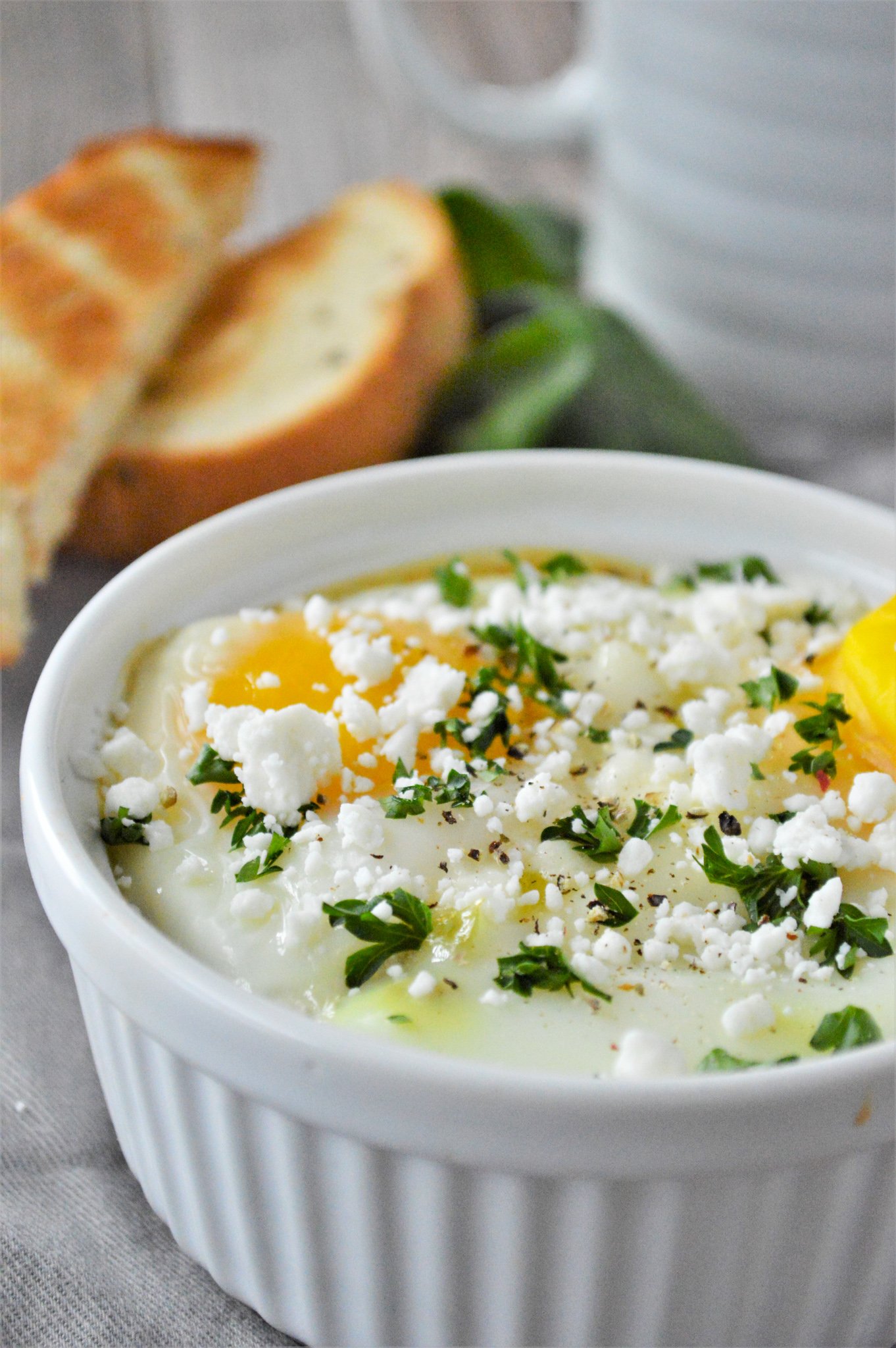 Greek Baked Eggs eggs with parsley. 