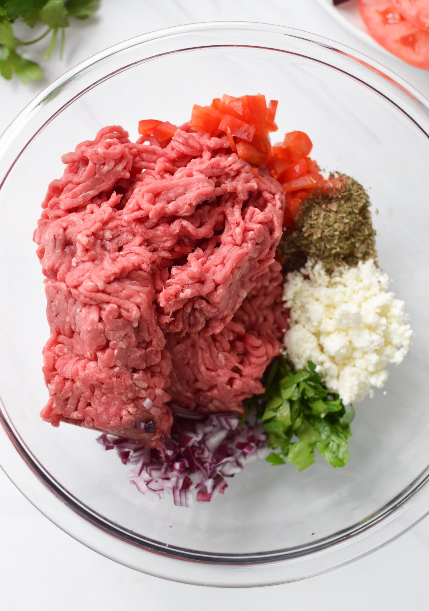 Feta Burger with Tzatziki ingredients in a bowl. 