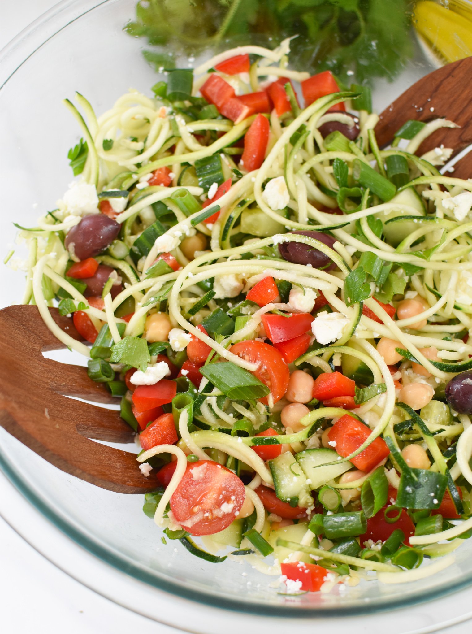 Mediterranean Zucchini Pasta Salad in a glass bowl.