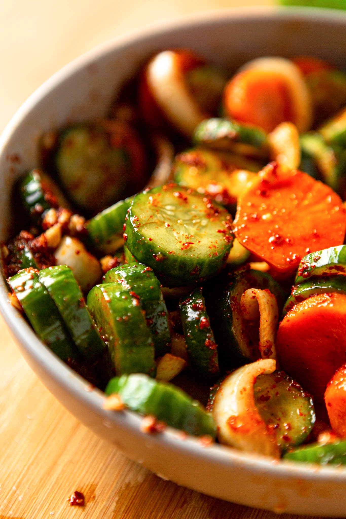 Quick Korean Cucumber Kimchi in a white bowl.