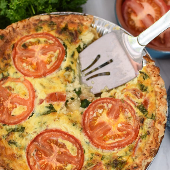 Caprese Quiche Lorraine Recipe with pie server.