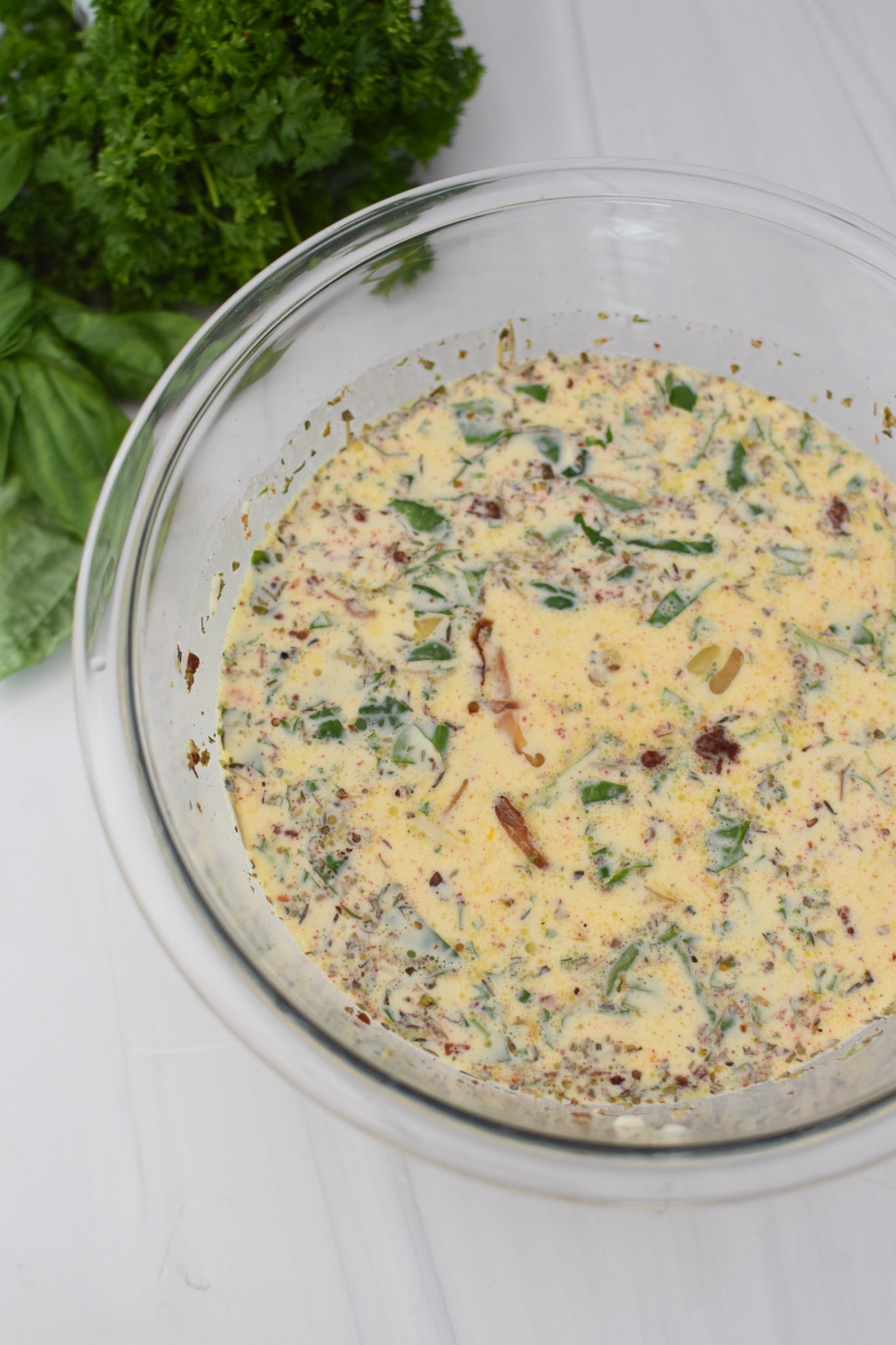 Caprese Quiche Lorraine Recipe ingredients in a bowl. 