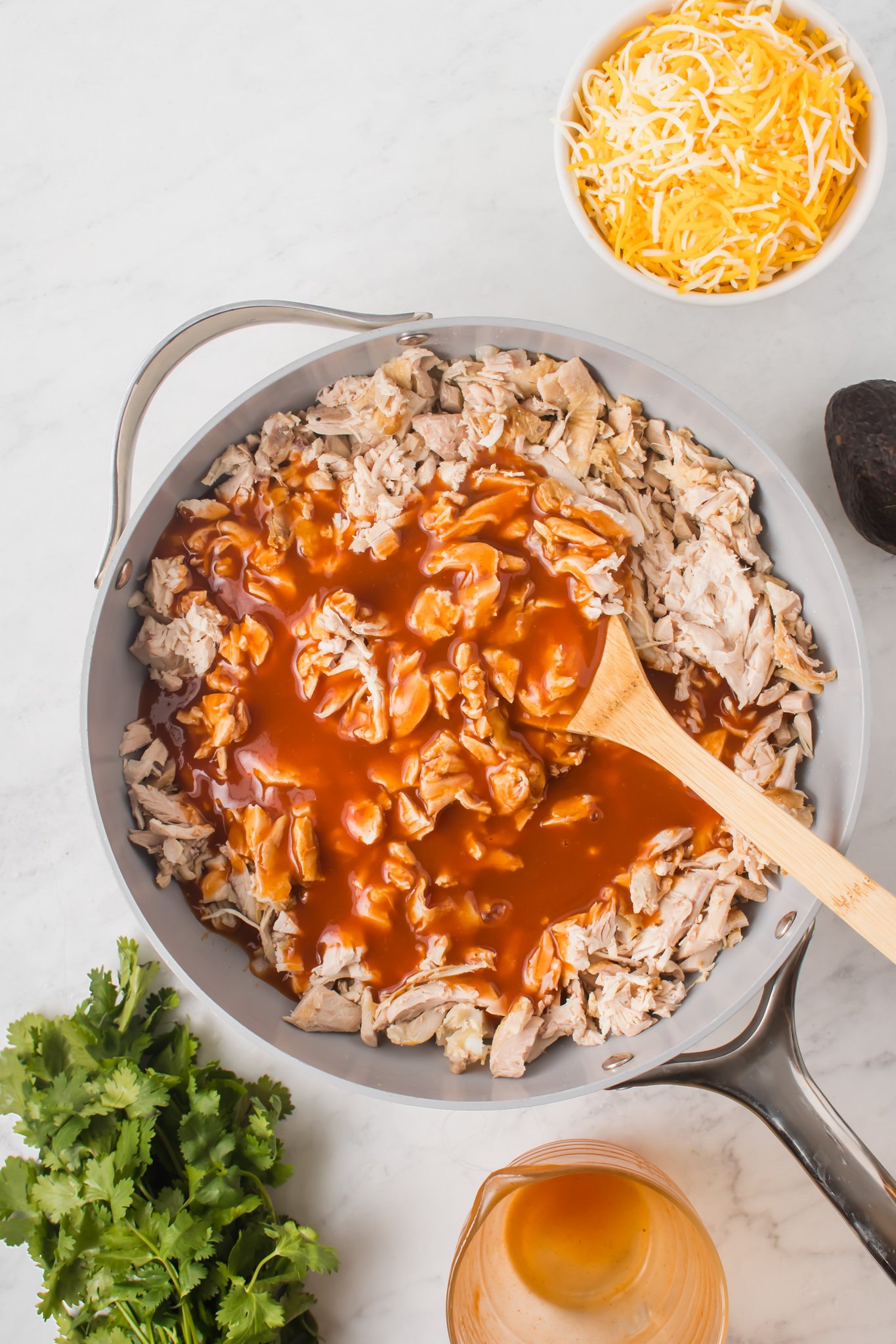 Chicken Enchilada Sliders chicken with sauce. 