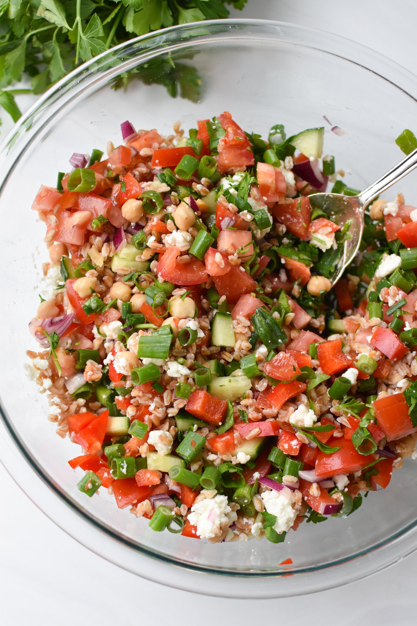 Mediterranean Farro Salad with a spoon.