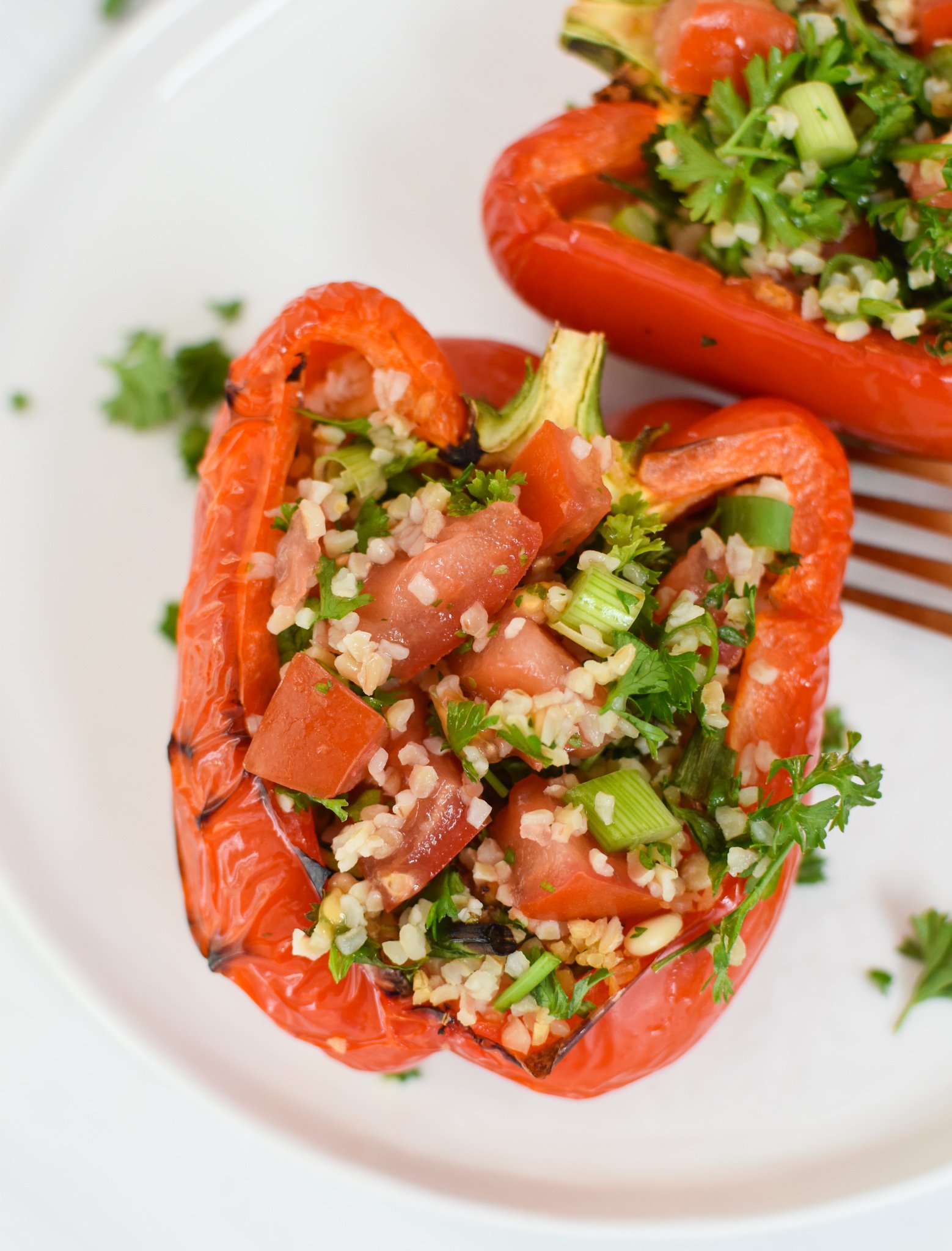 Vegan Stuffed Peppers Recipe tabbouleh in peppers.