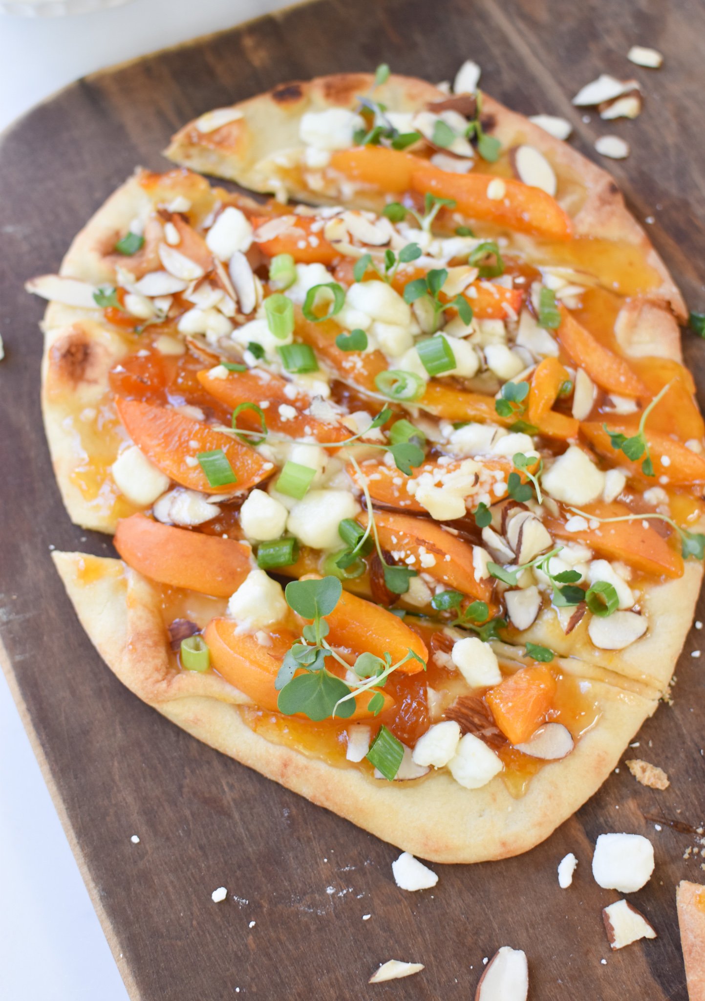 Goat Cheese Apricot Pizza cut up pizza. 