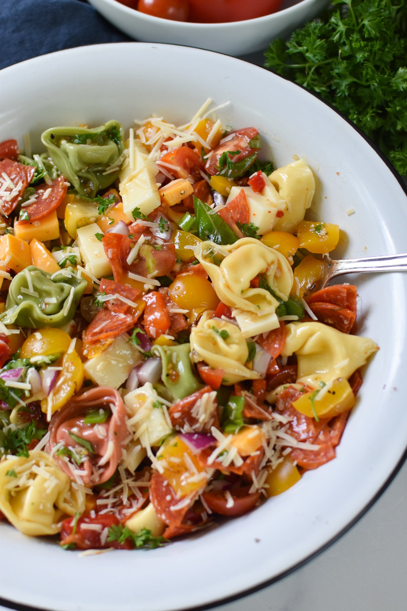Italian Tortellini Salad in a white bowl.