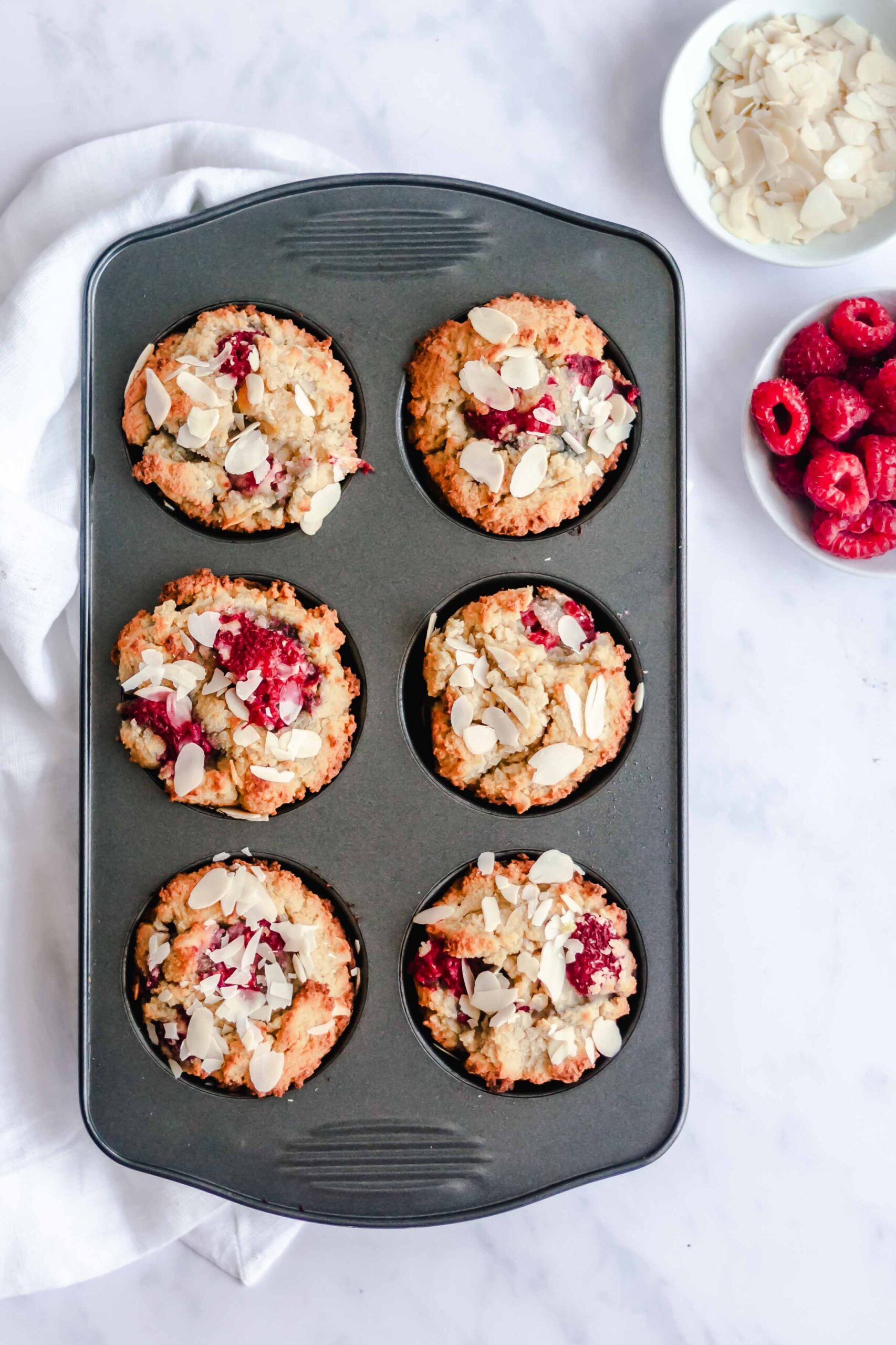Keto Raspberry Muffins with raspberries.