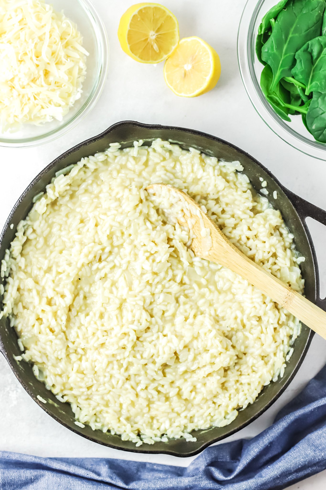 Oven Baked Chicken Thighs with Risotto risotto in a skillet. 