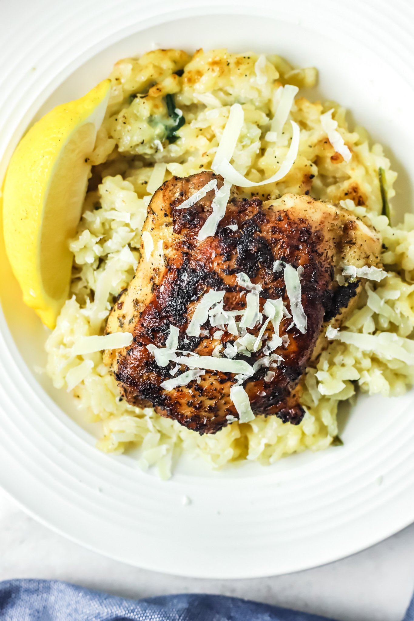 Oven Baked Chicken Thighs with Risotto with parmesan cheese. 
