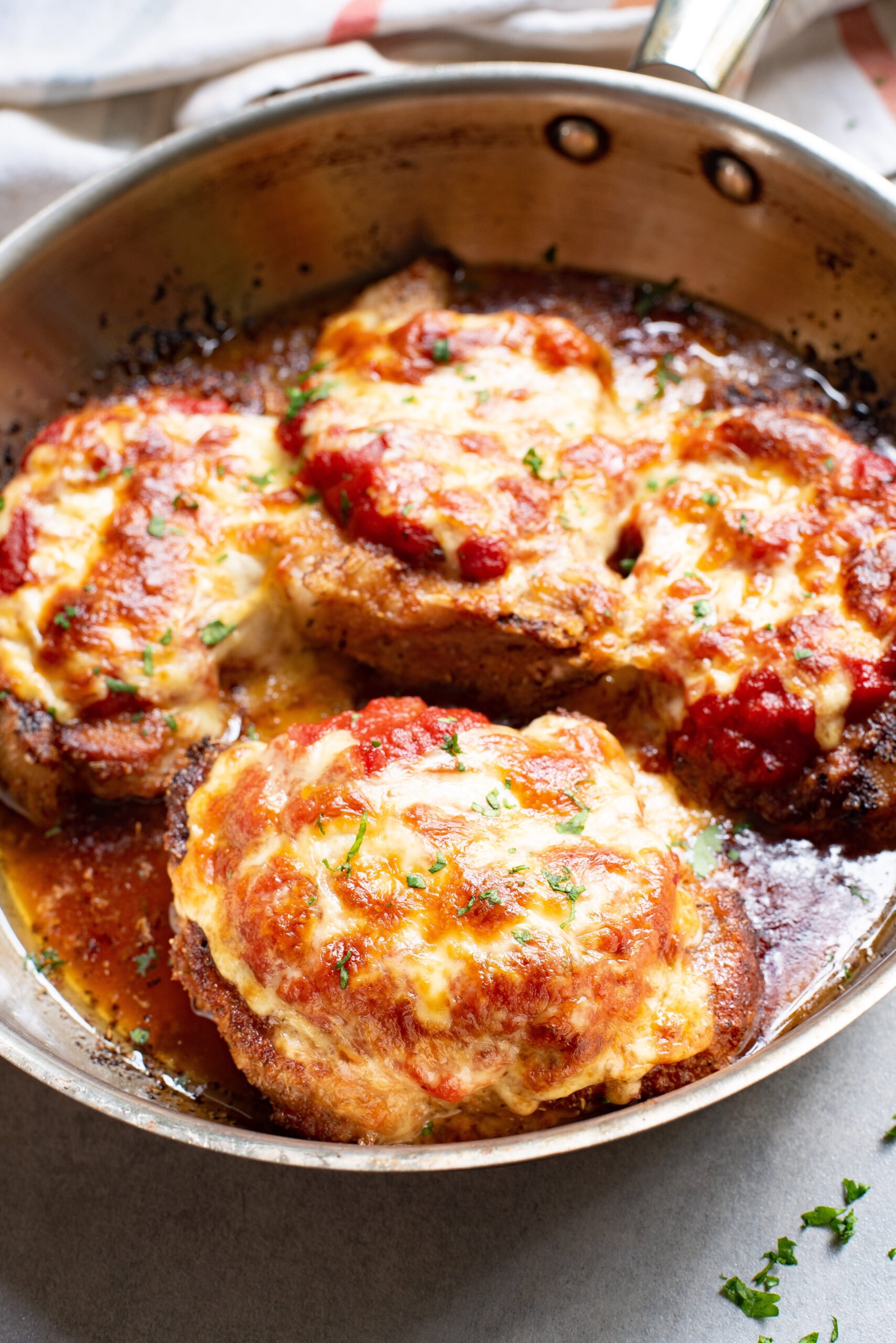 Parmesan Crusted Pork Chops with cheese melted.