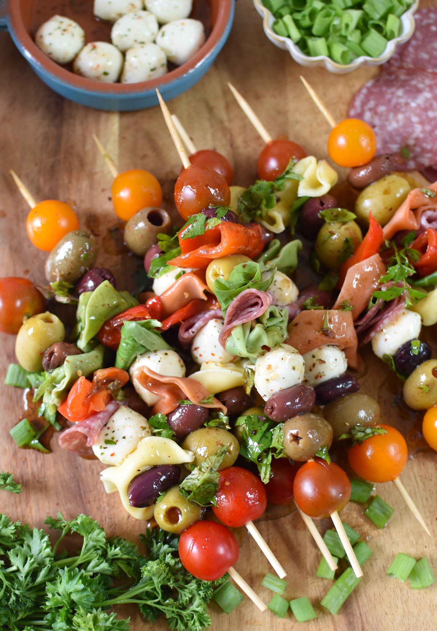 Antipasto Skewers on a cutting board. 