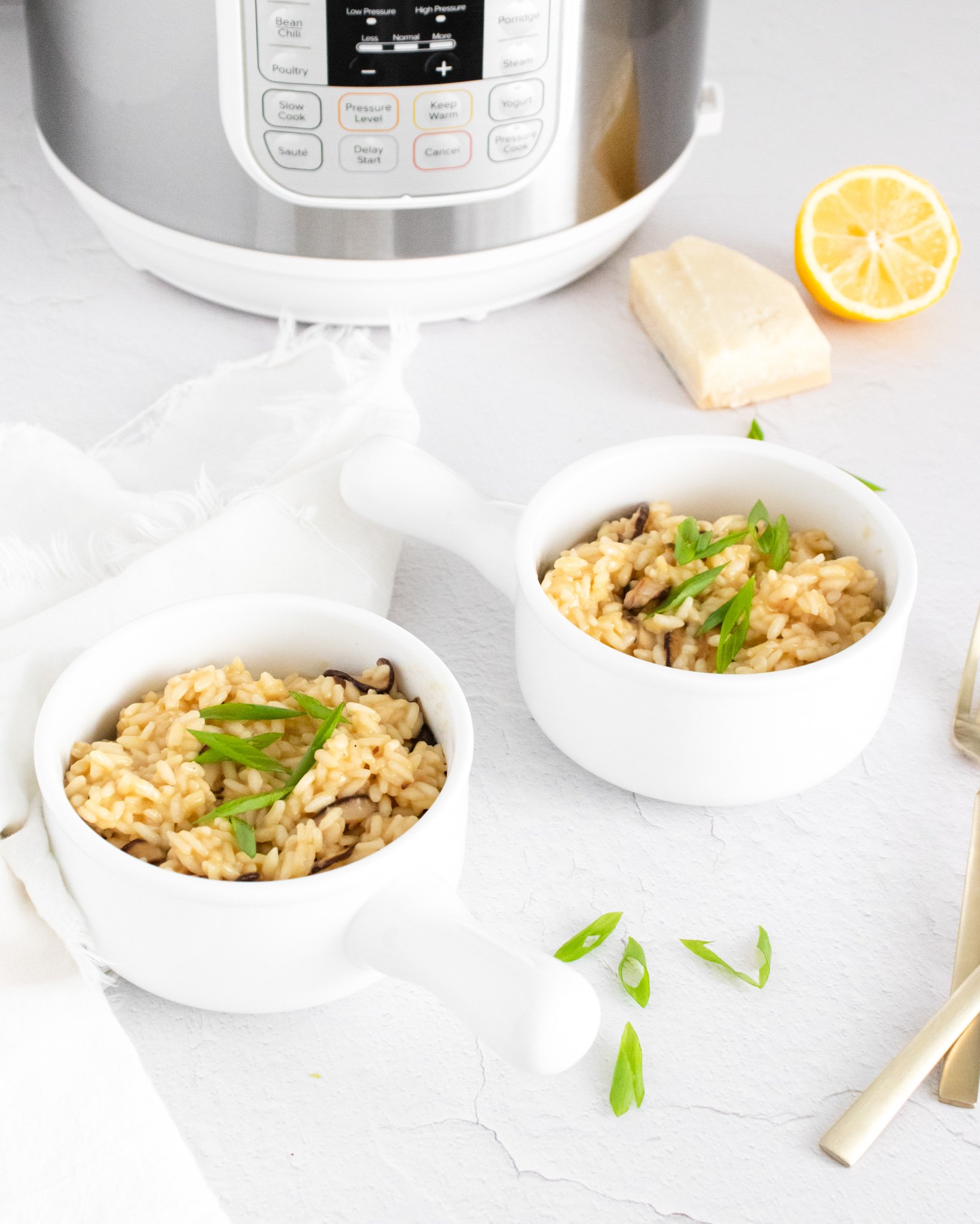 Instant Pot Mushroom Risotto in white bowls. 