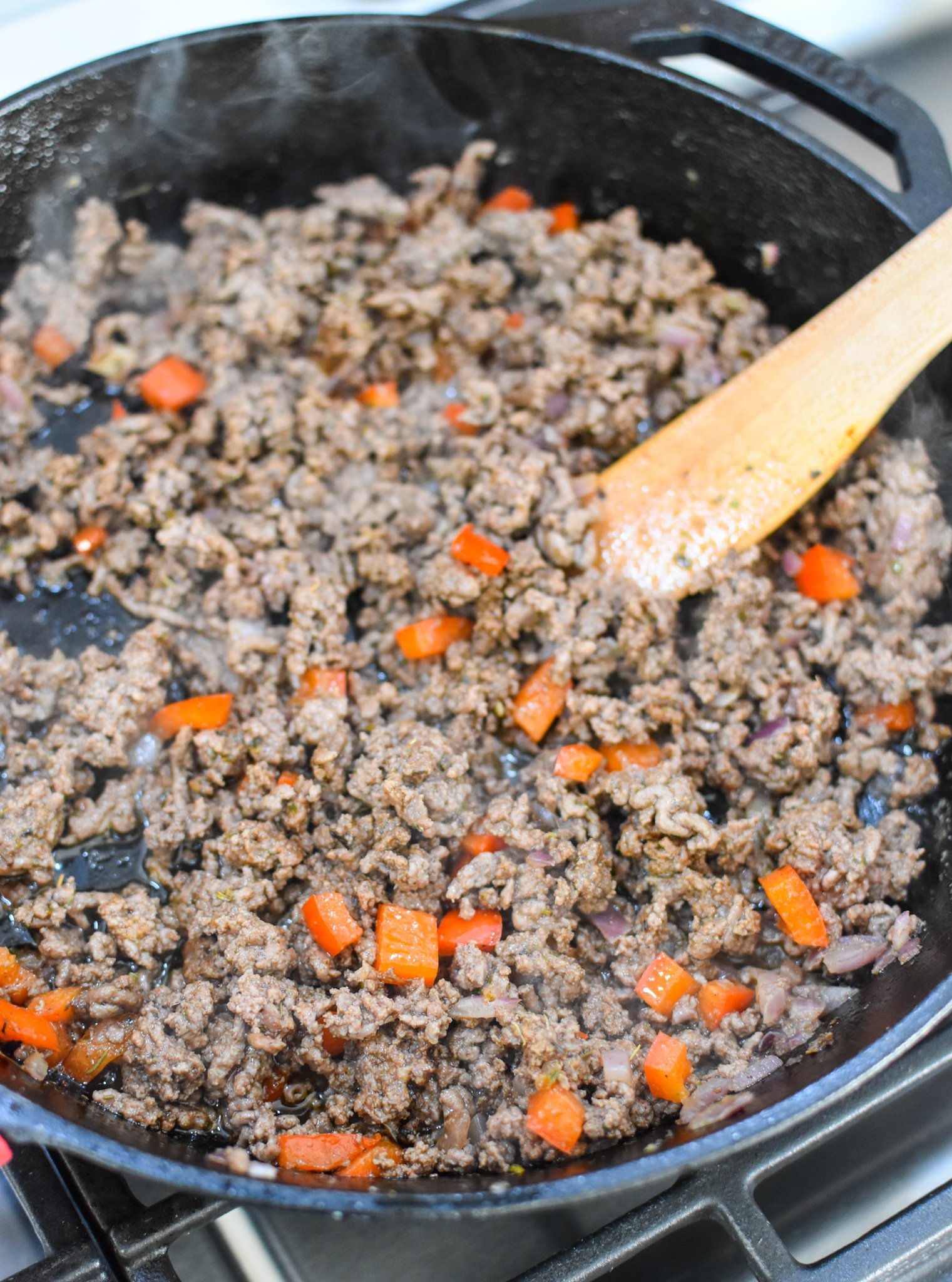 Mediterranean Ground Beef Zucchini Skillet beef cooking.