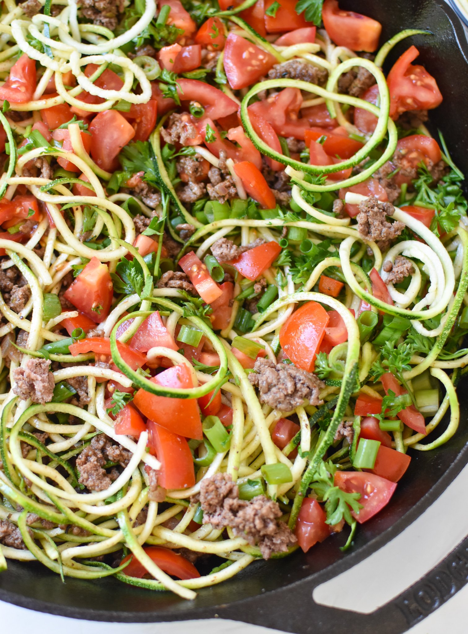 Mediterranean Ground Beef Zucchini Skillet with fresh tomatoes. 