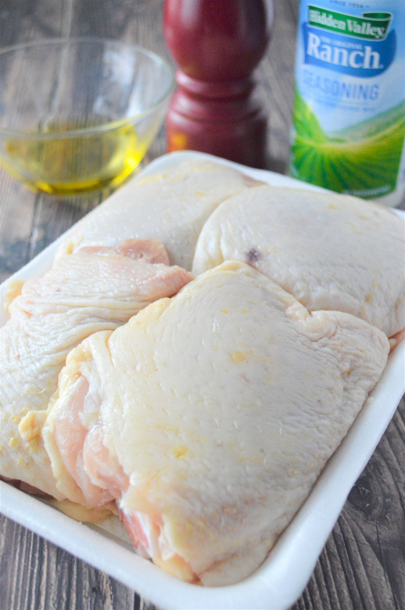Oven Baked Ranch Chicken Thighs chicken in a dish.