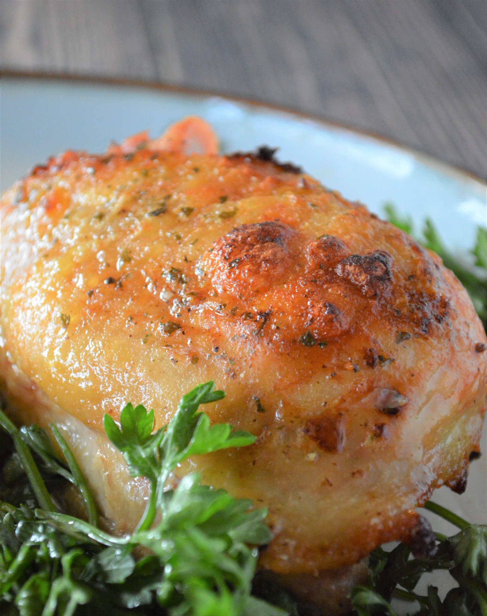 Oven Baked Ranch Chicken Thighs in a white dish.