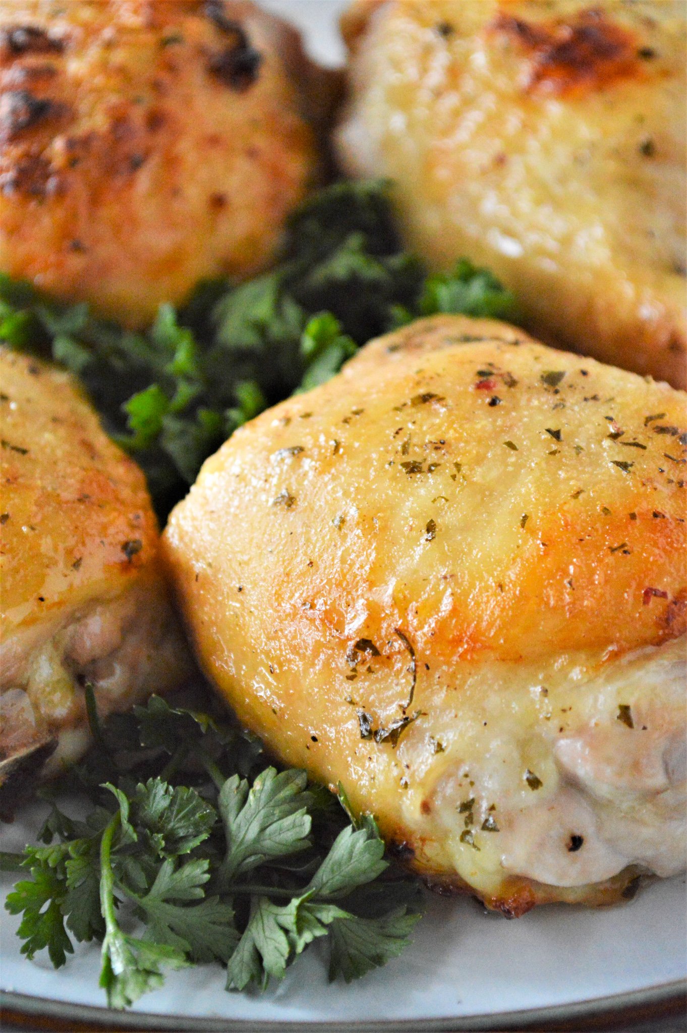 Oven Baked Ranch Chicken Thighs on a plate.