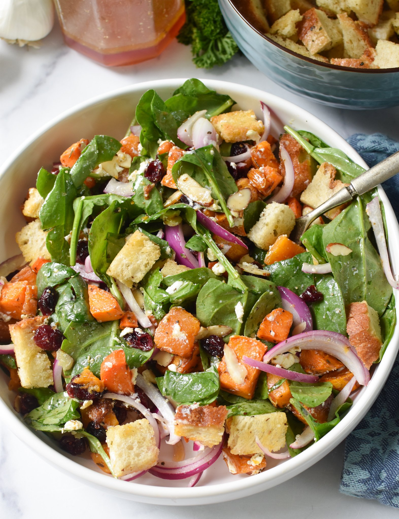 Roasted Vegetable Salad in a white bowl. 