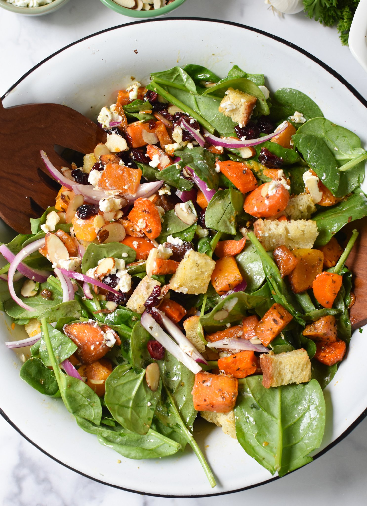 Roasted Vegetable Salad in a white bowl. 
