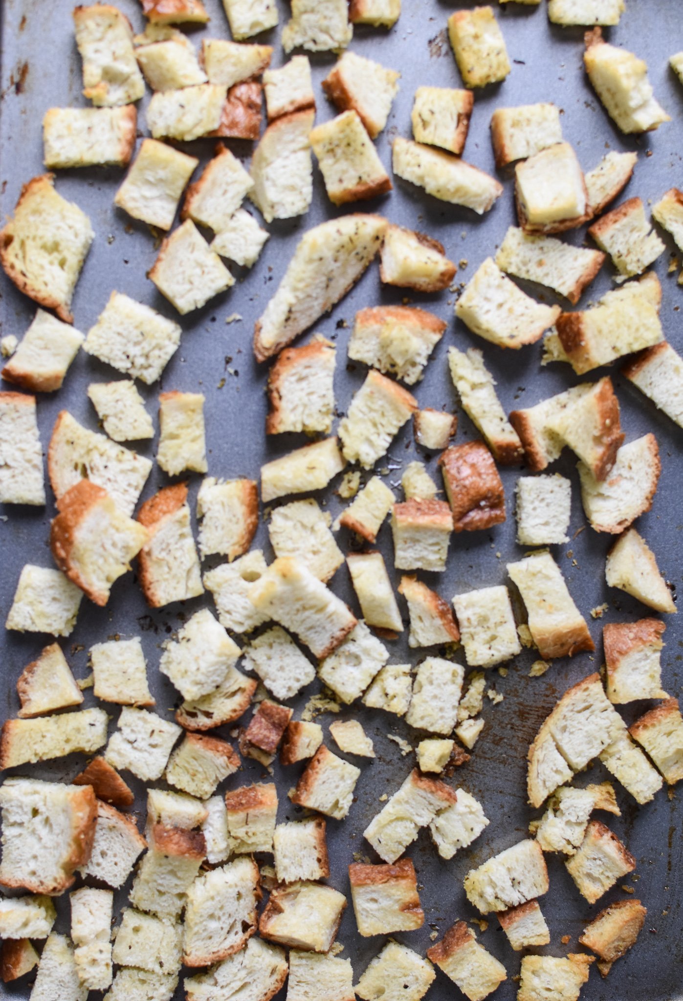 Roasted Vegetable Salad croutons on a baking sheet. 