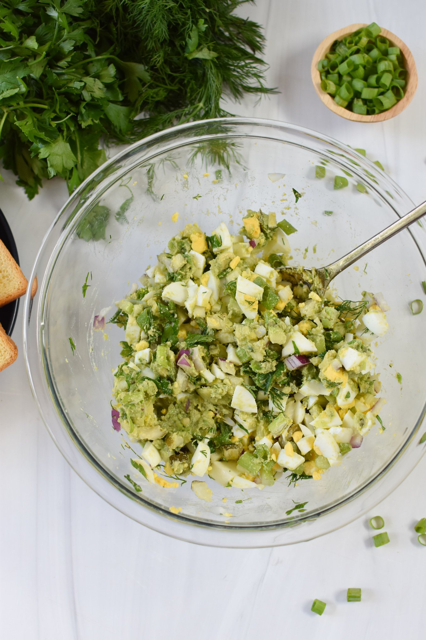 Avocado Egg Salad mixed egg salad in a bowl. 